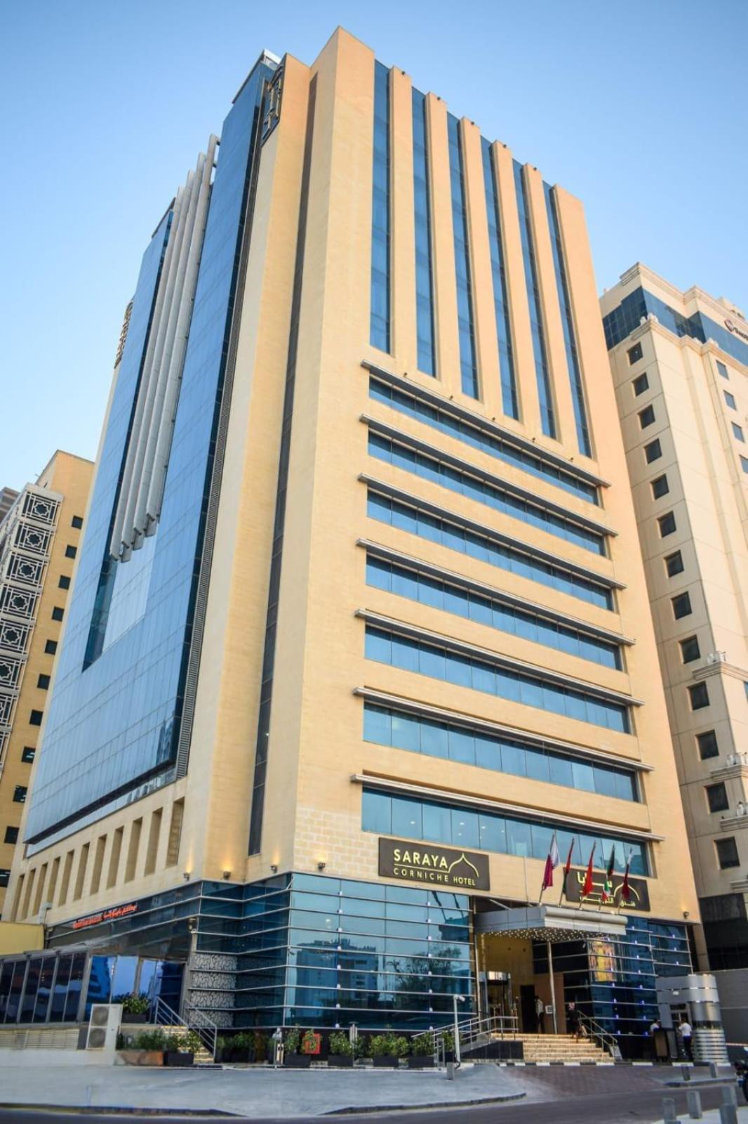 Saraya Corniche Hotel Doha Exterior foto The headquarters of the National Bank of Kuwait in Kuwait City